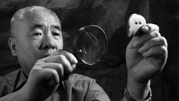 出土神秘玉面人身份成谜