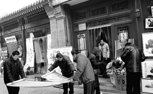 央视新闻频道揭假画真相