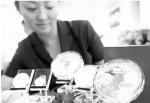 国庆60周年银币12000涨至51200元