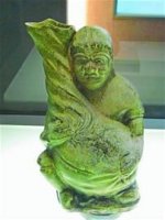 残破古墓现4件国家一级文物